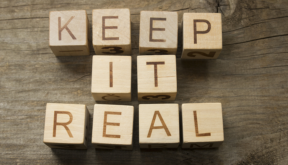 KEEP IT REAL spelled out on wooden blocks