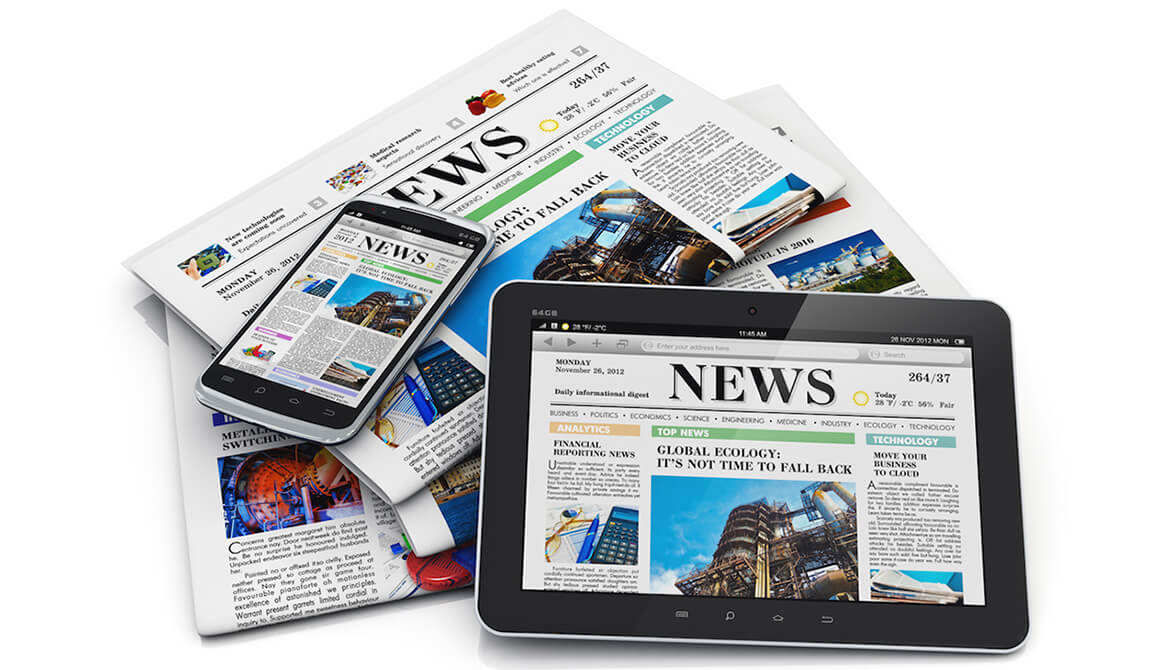 media news displayed on tablets and newspapers