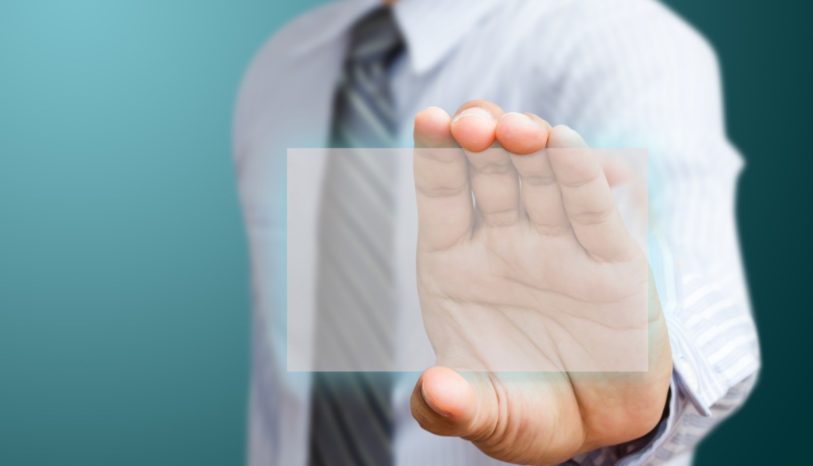 man holding up transparent screen