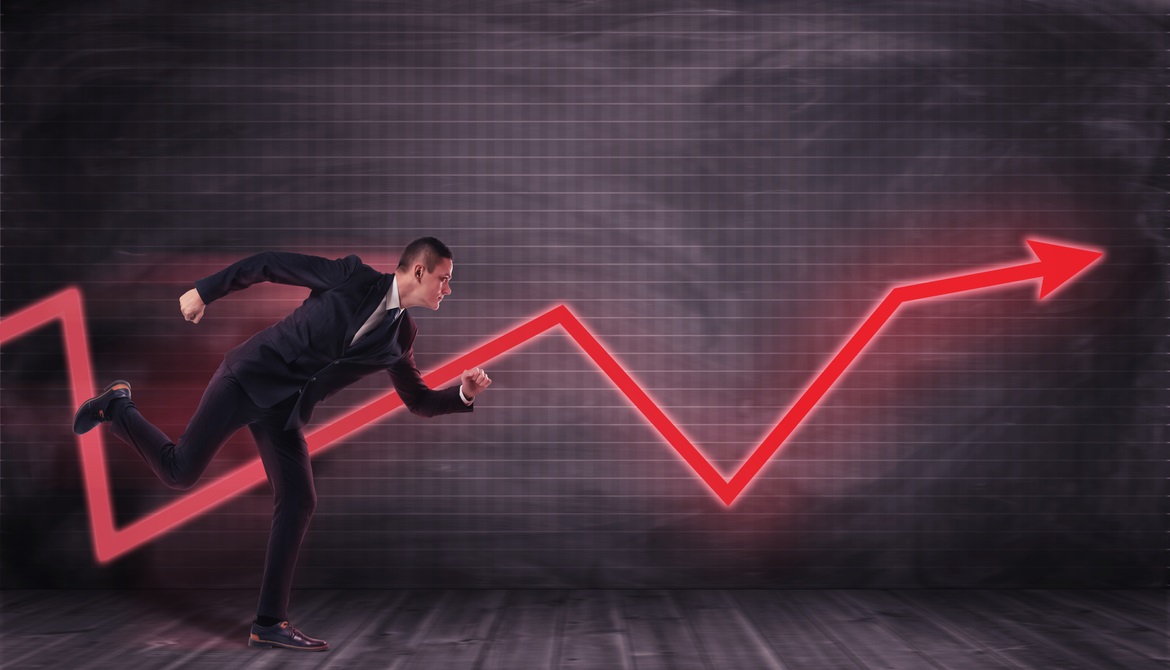 Man running alongside a fluctuating red arrow