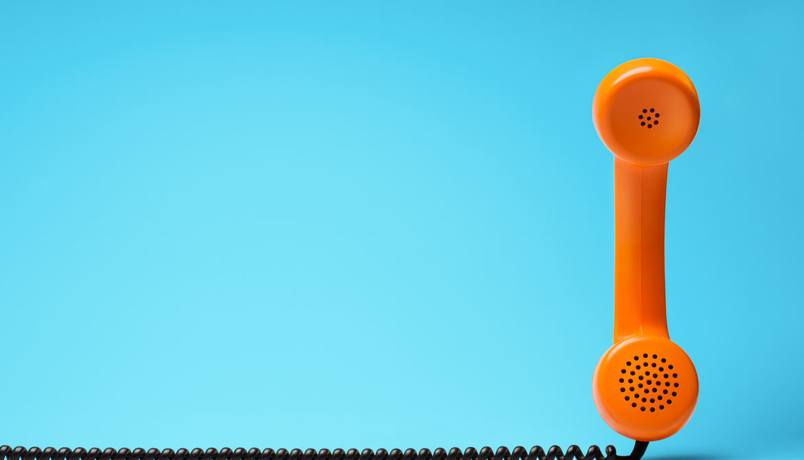 orange phone on blue background