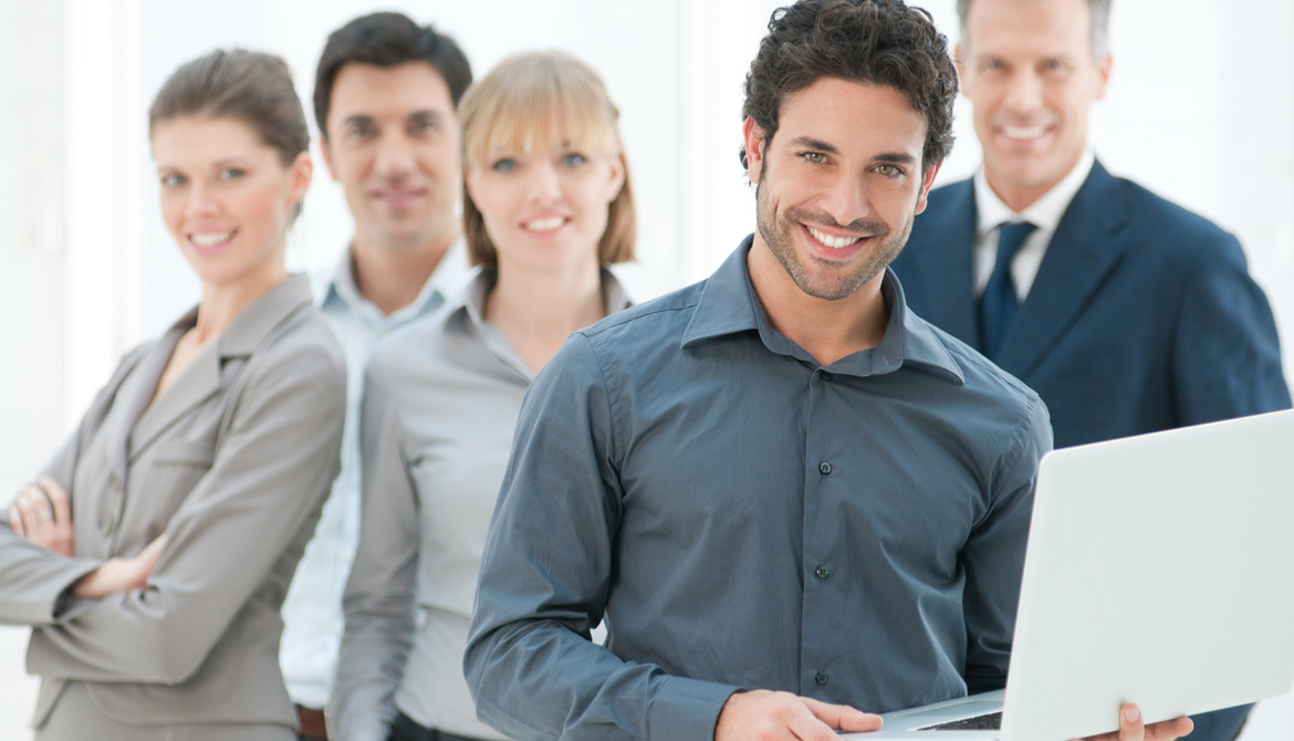 Smiling employees of various ages