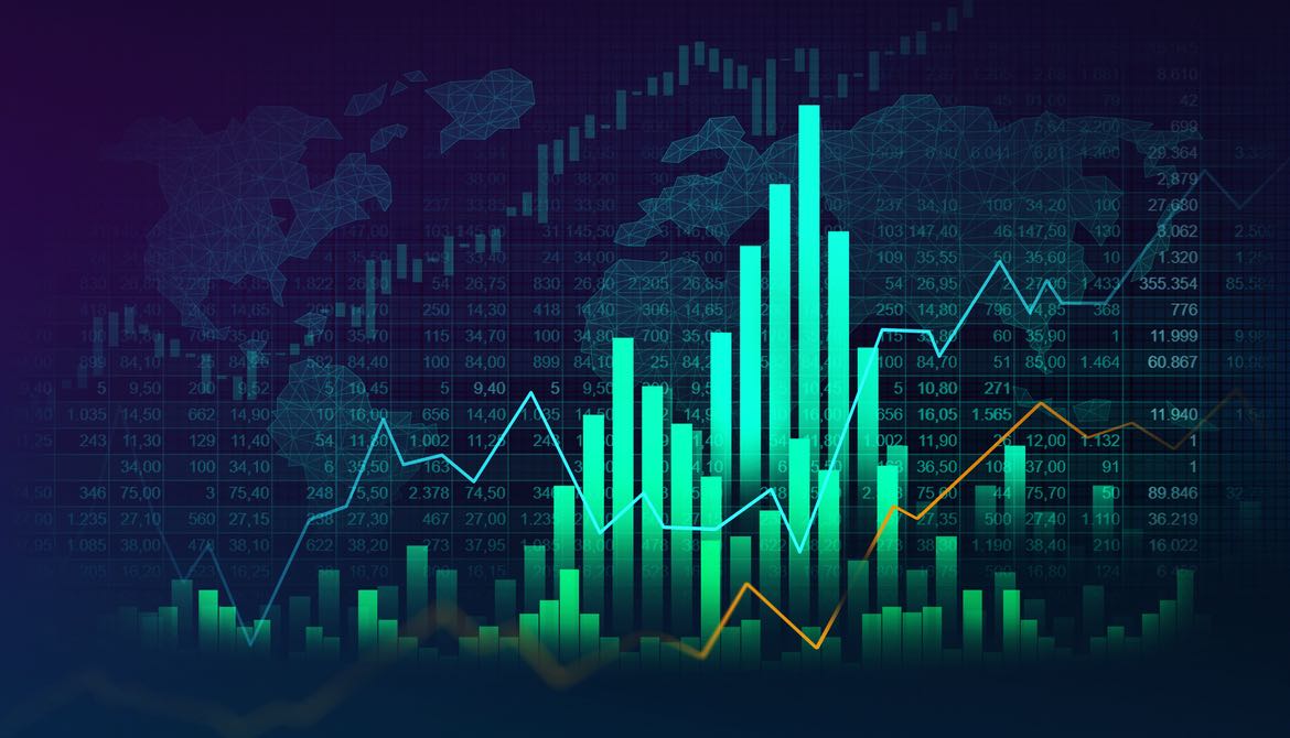 graphs of economic trends over a digital image of world map