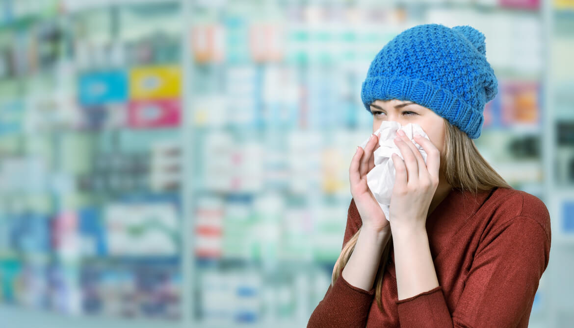 Woman sneezing