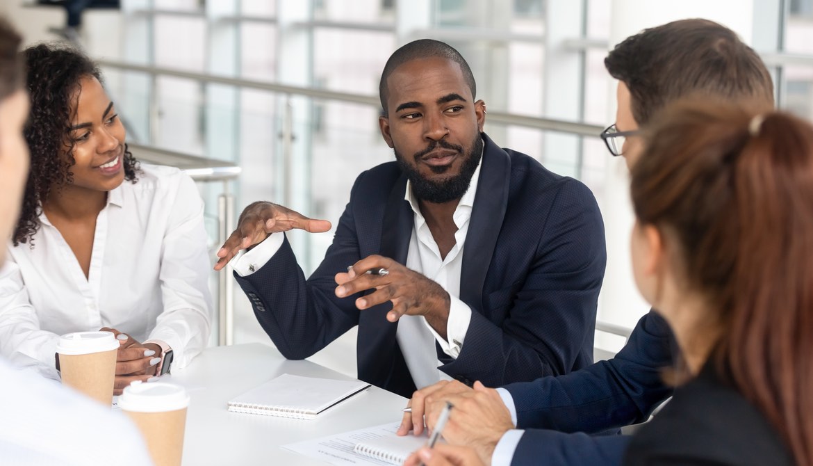 leader communicating in a meeting