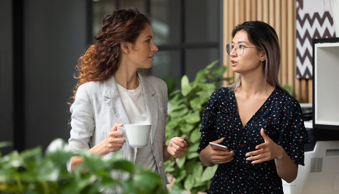 one female executive telling a story to another 