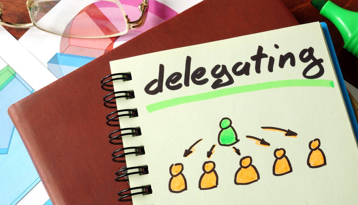 Notebook with delegating sign