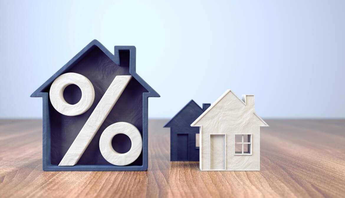 wooden houses with percent sign