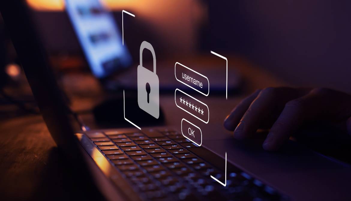 secure username and password prompt floating above a laptop keyboard
