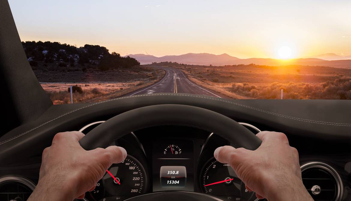 driving at sunset view out windshield