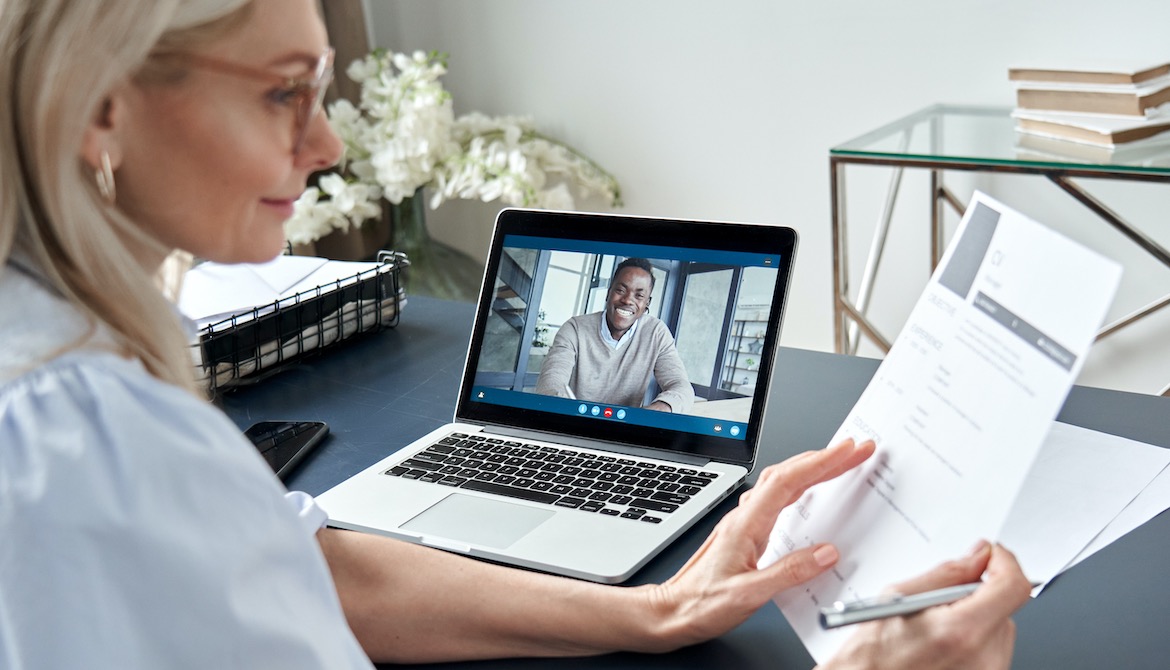 HR manager interviewing job candidate by video conference