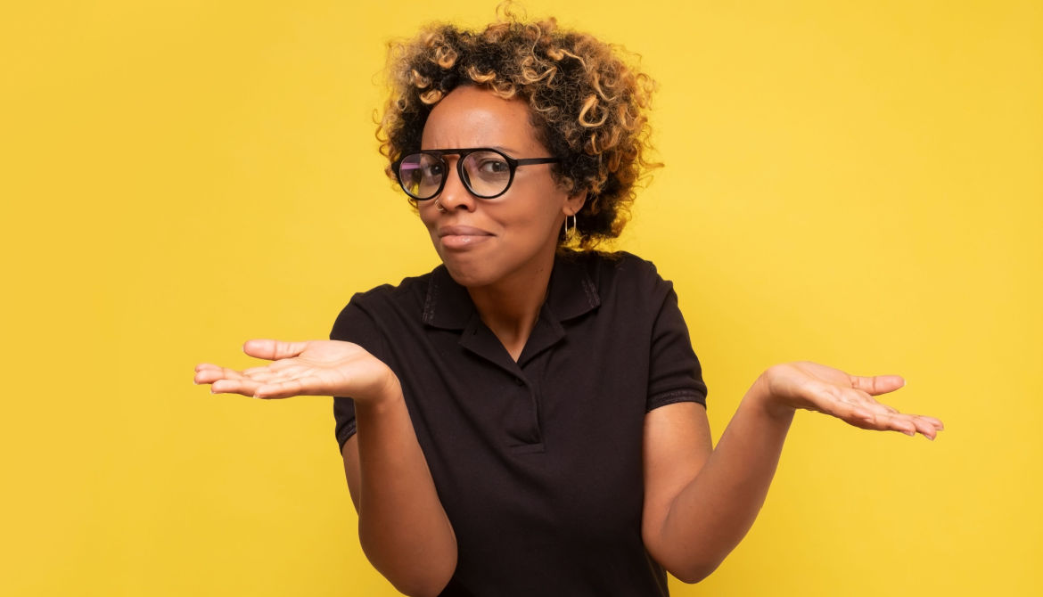 young woman shrugging why