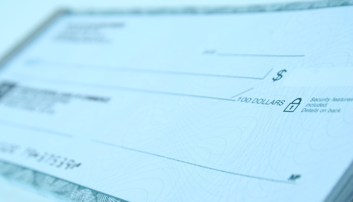 close-up image of a blank bank check or cheque