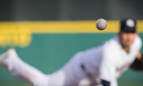 baseball pitcher throwing ball