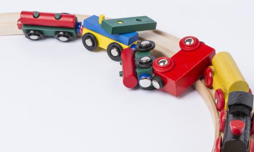 derailed wooden toy train