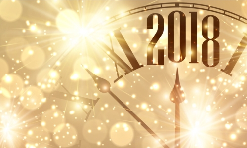 sparkling clock with hands moving toward 2018