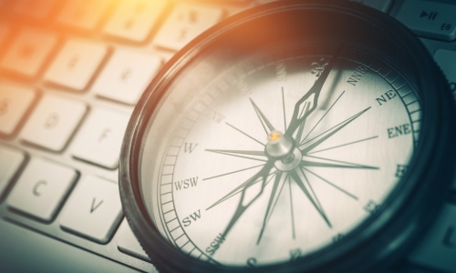 compass set on a keyboard
