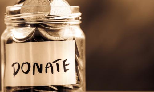 coins in a donate jar