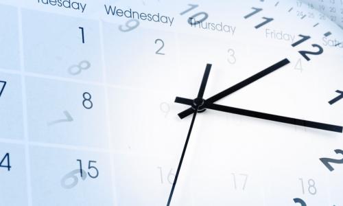 calendar overlaid with a clock face to represent time management