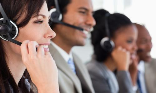 line up of diverse call center workers