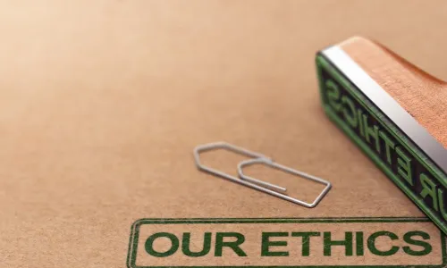 green stamp saying our ethics