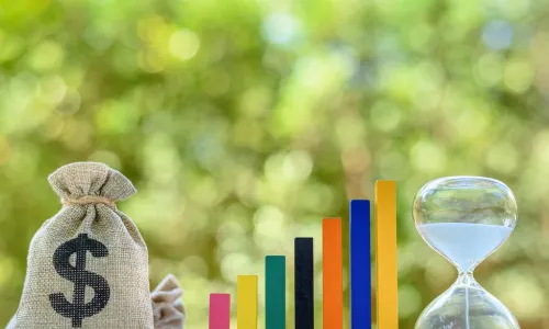 money bag with financial chart blocks and hourglass