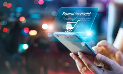 woman using mobile phone on colorful night background