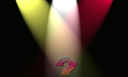 spotlights on a question mark