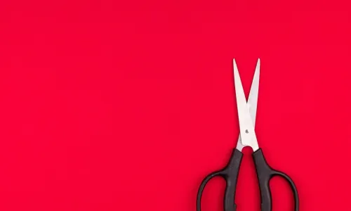 scissors on a red background