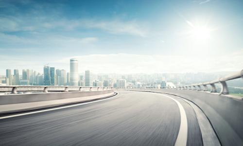  Highway overpass motion blur effect with modern city background