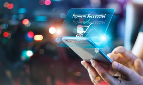 woman using a smartphone to make a payment