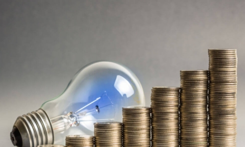 graph of stacks of coins with light bulb