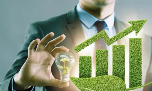 executive green graph light bulb