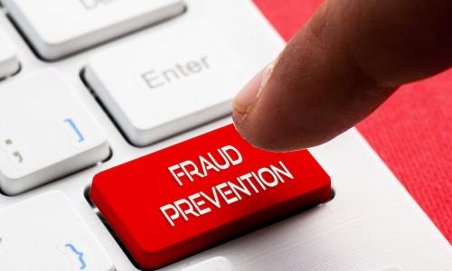 fraud prevention key keyboard finger