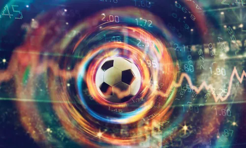 soccer ball passing through swirling digital goal