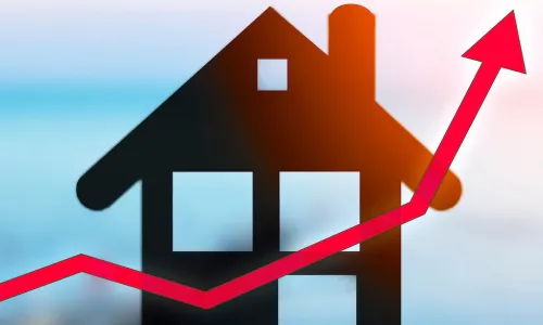 a block house has a red graph arrow going up and up